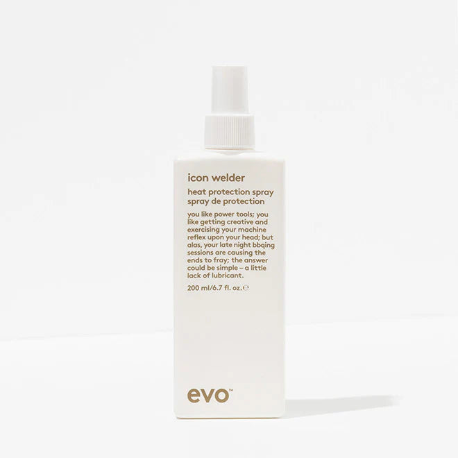 This image features the EVO Icon Welder Heat Protection Spray in a sleek, white 200ml spray bottle. The product is clearly labeled with details such as the spray type, its volume, and its intended use for hair protection against UV and heat damage.